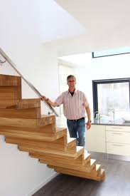 faltwerktreppe eiche massiv mit stufenbeleuchtung in der wand und handlauf faltwerktreppe treppe innentreppen