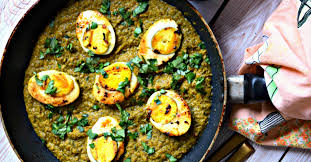 A Spicy Flavorful Indian Egg Curry With Boiled Eggs Cooked In Aromatic Green Masala Indian Whole Spice Egg Recipes Indian Curry Recipes Indian Curry Recipes