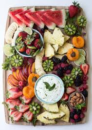 Peach smoothie crushed peaches and juice all blended with ice and swirled with raspberry. Summer Fruit Board Cache Valley Family Magazine