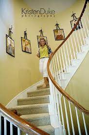 Pictures On Ribbons And Hooks Going Up Stairs Home Decor Stair Wall Decor Staircase Wall Decor