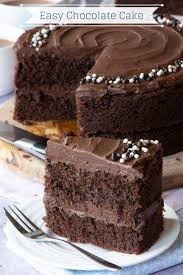 The recipe produces a large stacked rectangular layer cake with whipped cream cheese in the frosting to add lightness and stability. Easy Chocolate Cake Charlotte S Lively Kitchen