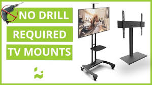How to mount a tv on the wall without holes. Mount Your Tv Without Drilling Holes In Your Wall Kanto Solutions Youtube