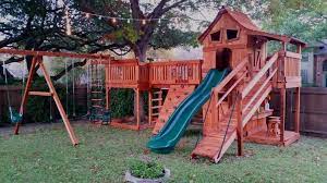 Redwood Playset With Cabin Bridged To Tree Deck In 2021 Backyard Swing Sets Decks Backyard Backyard Fun