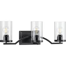 When shopping for a modern black vanity light, you will undoubtedly be presented with a myriad of sizes, lamping types, and finish options. Lassiter Collection Three Light Matte Black Clear Glass Modern Bath Vanity Light P300258 031 Progress Lighting