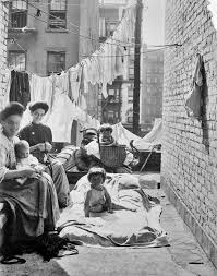 This tenement bedroom may appear simple, but it holds countless stories.  Within tight spaces, carefully stored belongings, immigrant families found  ways to make a place feel like home. What details stand out