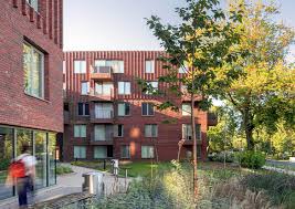 Winner of best multiple residential manchester society of architects awards 2017: Hulme Living Leaf Street Housing