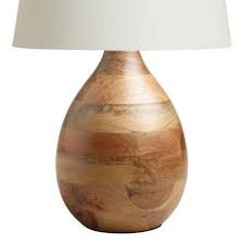 A table lamp's cozy and soothing lighting creates an intimate conversation space, inspirational workspace and stylish statement, all at the same time. Wood Teardrop Table Lamp Base World Market