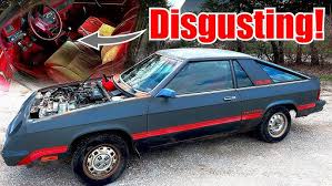 Image result for Black 1984 Plymouth