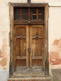 Old Wood Doors Old Wooden Double Doors With Windows On Top And Padlock In Front Old Wood Doors Wooden Double Doors Windows And Doors