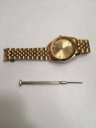 Strike the other end of the pin pusher with the metal side of the watch hammer until the pin slides out. How To Remove Watch Links 5 Steps With Pictures Instructables