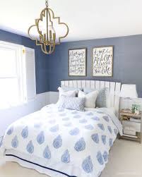 Interior designer tamsin johnson stacked two small pieces in the corner and then hung for an affordable display of wall art, mix in framed pieces with taped up vintage finds or your own artwork. How High To Hang Pictures Simple Tips For Getting It Right Driven By Decor