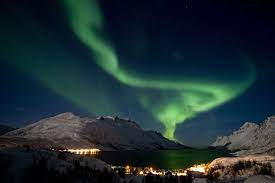 The Northern Lights Shine Over Norway See The Northern Lights Aurora Boreal Northern Lights