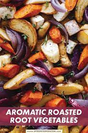 Aromatic Roasted Root Vegetables Side Dish Spoon Fork Bacon Recipe Roasted Vegetable Recipes Roasted Root Vegetable Recipe Root Vegetables Recipes