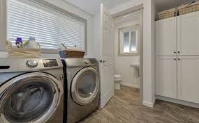 Organise laundry essentials in caddies. How To Design A Utility Room Which