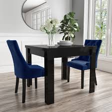 Think wicker or wood to achieve a breezy look, or go the more industrial route with a stylish metal finish. Vivienne Black High Gloss Dining Table Flip Top With 2 Navy Blue Velvet Dining Chairs Furniture123