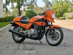 Image result for Orange Red 1957 Motorcycle