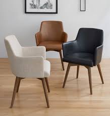 Due to the varying effects of natural and artificial lighting, slight variations in the colour of leather may appear in our lifestyle images and and the product may have natural blemishes that are visible. Dexter Arm Chair With Walnut Legs Rejuvenation Dining Chairs Waiting Room Chairs Chair Design
