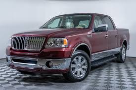 Image result for Dark Toreador Red 2006 Lincoln