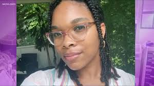 Black male surgeon braids patient's hair before surgery