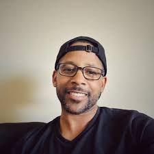 How to shorthand write 'If no low C extension, play up the octave' for  double bass players?