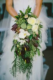 Beyond Flower Crowns Bohemian Wedding Ideas For Your Big Day Junebug Weddings Cascading Wedding Bouquets Spring Wedding Flowers Flowers Bouquet