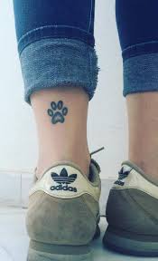 Paw print tattoos can express a wide range of meanings. 47 Tiny Paw Print Tattoos For Cat And Dog Lovers Revelist