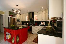 If youâ€™re remodeling your kitchen, then kitchen cabinets may be top on your list to replace. Kraftmaid Maple Marquette Dove White With Cinder Glazing Granite Counters Red Island Black Tiles Stainless St Black Tiles Under Cabinet Lighting Kraftmaid
