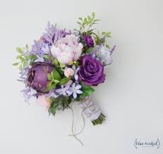 Browse the images from real weddings below to get inspiration for your own wedding or bridesmaid bouquets in shades of purple! Boho Bouquet Purple Lavender Wildflower Bouquet Light Purple Peony Bouquet Wedding Bouquet B Purple Bouquets Purple Bridal Bouquet Peony Bouquet Wedding
