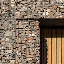 Gabions, gabion baskets, stone baskets, stone grids and accessories for private and commercial customers. Architecture With Gabion Walls Dezeen
