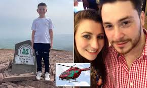 Boy, eight, completes walking challenge to thank Welsh air ambulance crew  who saved his life