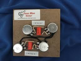 You get a pro bucker about standard for any single coil i'd say. Upgrade Guitar Wiring Harness Kits Gibson Epiphone Fender