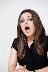 Mila Kunis ( in character ) Dr. Sharon Gil (