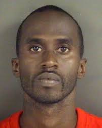 Fayetteville man sought, accused of pushing girlfriend into fire