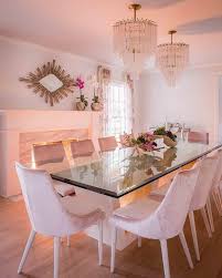Explore 3 listings for dining table with velvet chairs at best prices. Modern Dining Table With A Glass Top And Beveled Edges Feature A White Geometric Base Surrounding Pi Pink Dining Rooms Regency Dining Room Velvet Dining Chairs