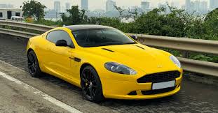Image result for Sunburst Yellow 2017 Aston Martin