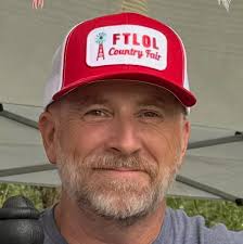 What is a specialty car in the context of Cars and Coffee events?