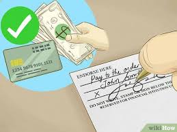 This officially signs the check over. How To Sign Over A Check 12 Steps With Pictures Wikihow