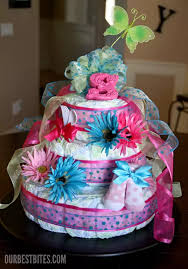 These are instructions on how to make the beautiful spiral shaped diaper cakes for baby showers. How To Make A Diaper Cake Centerpiece Our Best Bites
