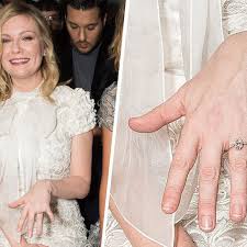 Getty images michael, at 60 years old, is more than twice kitty's age and five years older than her father earl spencer. Kirsten Dunst S Engagement Ring May Have Cost 80 000