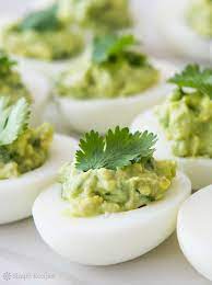 Guacamole Deviled Eggs Avocado Deviled Eggs Simplyrecipes Com Recipe Avocado Recipes Guacamole Deviled Eggs Healthy Snacks