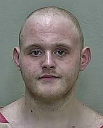 Silver Springs man charged with threatening woman with hatchet