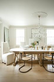 Classic Modern Dining Room White Chandelier And Medallion Oval Dining Table Modern S Modern Farmhouse Dining Room Mismatched Dining Chairs Modern Dining Bench