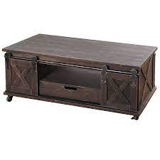 Brown medium round wood coffee table with plank design base. Dark Brown Barn Door Coffee Table With Drawer Kirklands