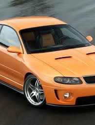 Image result for Sunburst Orange 2004 Pontiac