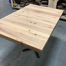 This variety of plywood is designed to be very durable in the face of both physical wear and rain damage. Kole Made Reclaimed Solid Heart Pine Table Top