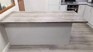 Light grey gloss kitchen with oak worktop offcuts patreon logo. Kompact Slab Light Grey Gloss Kitchen Wood Effect Laminate Appliances