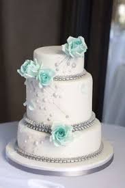 White Cake With Mint Green Roses And Bling Silver Wedding Cake Wedding Anniversary Cakes Simple Wedding Cake