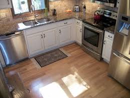 Dark cabinets with grey countertops. Baltic Brown Granite Countertops Texture And Charm To The Kitchen