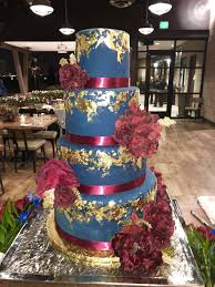 We do not offer delivery at this time on our large cake range only collection from our store in west footscray. Wedding Cake Gold Leaf Navy Blue And Maroon 4 Tiers Wedding Cakes Maroon Burgundy Wedding Cake Royal Blue Wedding Cakes