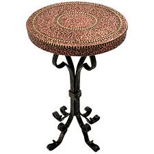 The warmth and beauty of these unique copper dining tables comes alive with the handcrafted nature of each piece. Drinks Table Gueridon End Table In Hand Forged Iron With Copper Top For Sale At 1stdibs